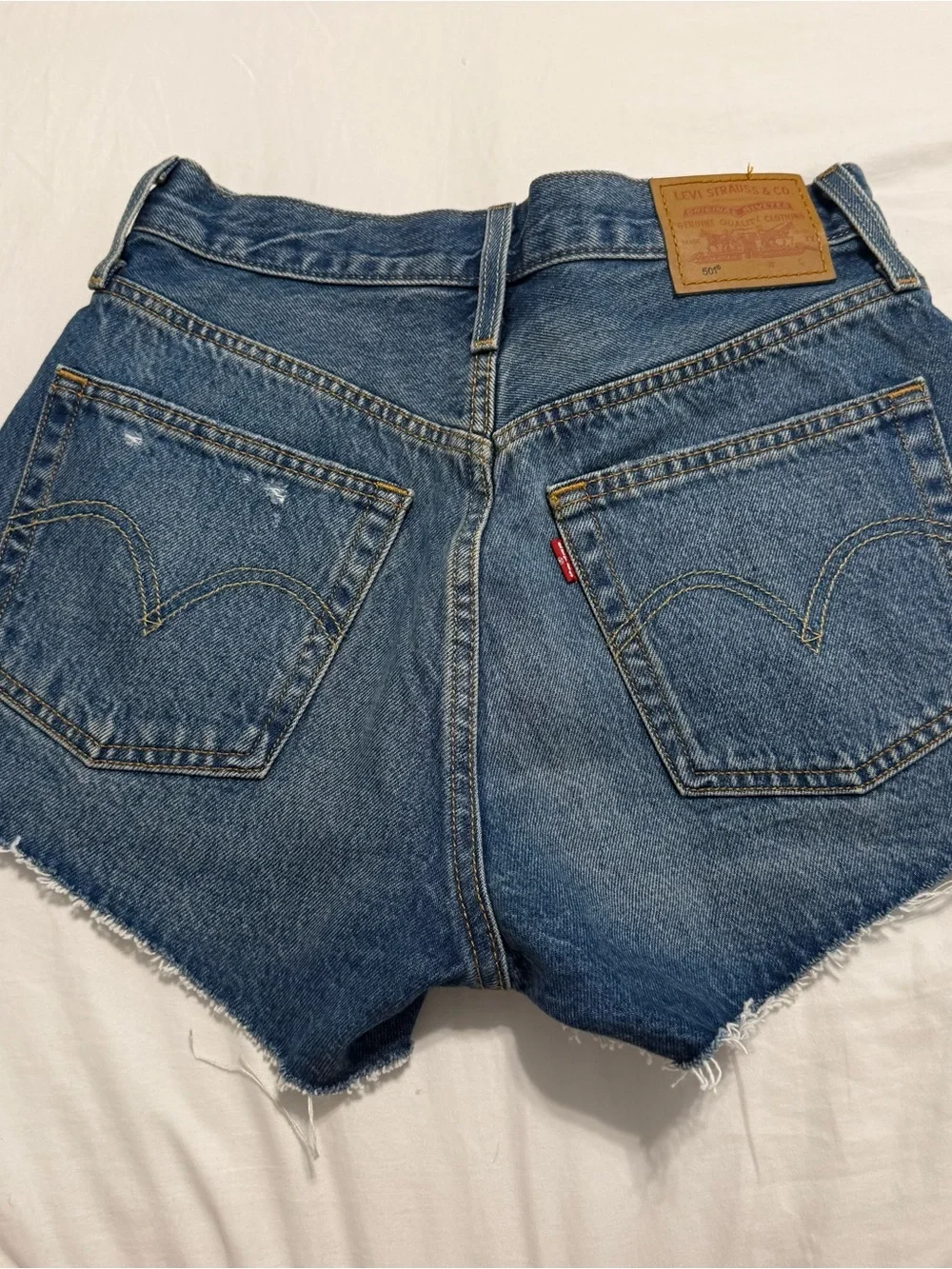 Levi's Distressed Mid Blue High-Rise Denim Shorts